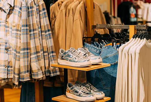 Clothes and shoes displayed in a store