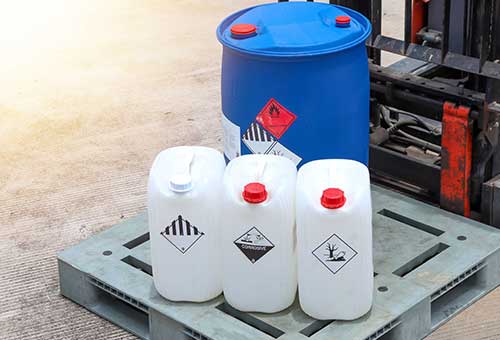 Containers filled with liquid chemicals